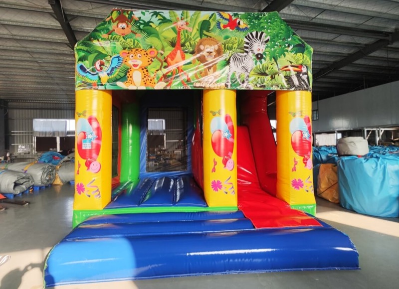 Jungle animal-themed bouncy castle with slide for parties in Cork