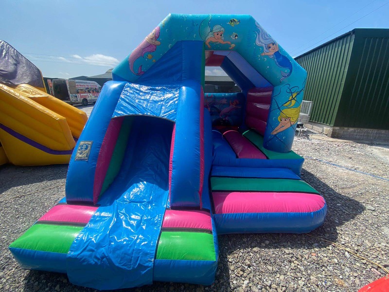 Mermaid-themed bouncy castle with slide for parties in Cork