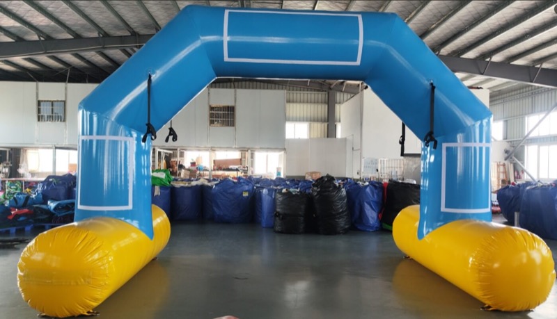 Blue and yellow inflatable start/finish arch for parties in Cork