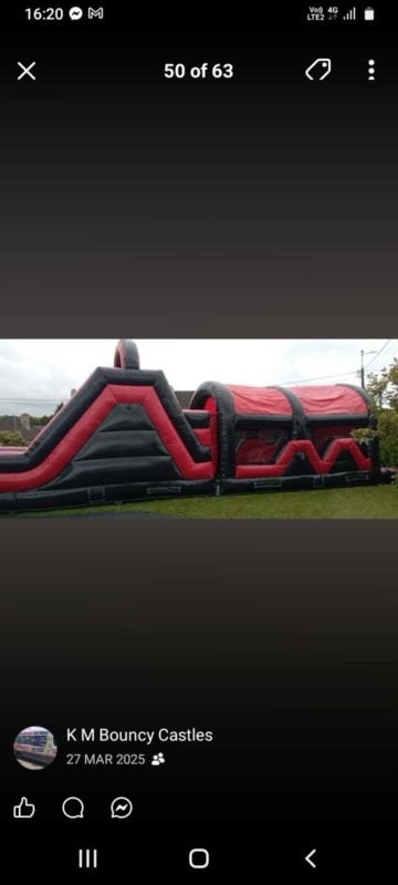 Black and red zigzag obstacle course with slide for parties in Cork