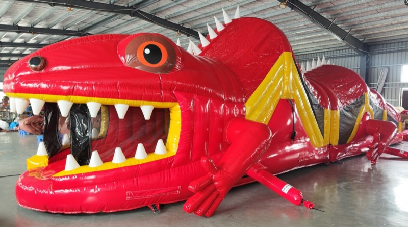 Giant red dragon-shaped obstacle course for parties in Cork